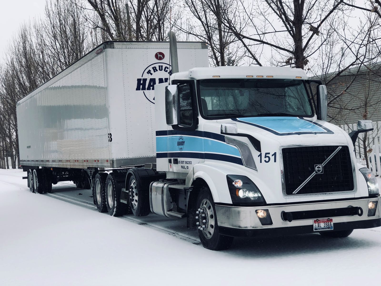 Handy Truck Line dry van truck in the snow at an Idaho terminal